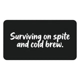 
Surviving on Spite and Cold Brew Desk Mat