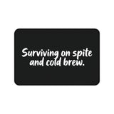
Surviving on Spite and Cold Brew Desk Mat