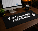 
Surviving on Spite and Cold Brew Desk Mat